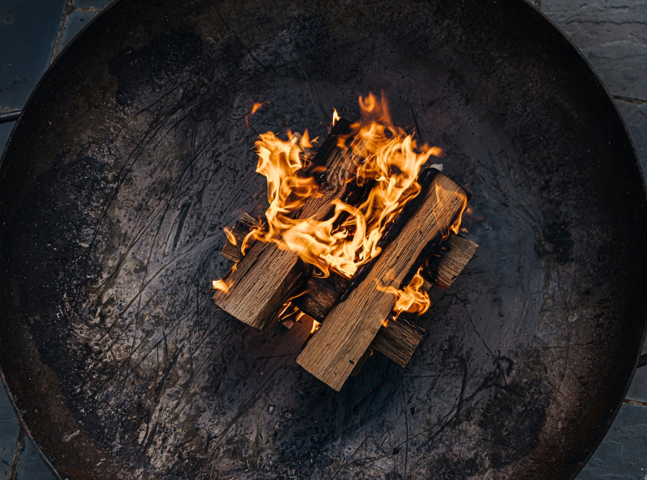Kiln-Dried vs. Seasoned Firewood: What Actually Matters